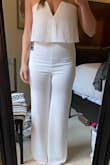 The seam up the center of the torso really helps to flatter the waist line. It does run really long but that is a good thing! A simple tailoring for a perfect fit with the perfect shoes. Can't go wrong. Great support up top but will wear nip covers. Can't wait to wear this! - Lauren B.