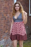 I received so many compliments on this dress! I loved the fit and length. I wore braless with it and had no malfunctions, lol. - Paula P.