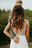 This dress was perfect for our destination wedding! I ordered it on a whim just to see if it was nice, I didn't want to dress shop. The dress fit perfect. The only alterations needed was the hemming & cups sewed into the bust. The bead work is absolutely stunning in person. I loved everything about this dress. The see through cut out sides were gorgeous as well as the low back! SO many compliments. - Chelsey A.