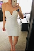 Beautiful dress, very slim fit, but thick fabric and well constructed. Great structure at the top and I can comfortably wear a strapless bra with it! Can't wait to wear it!! Bought in a size small and glad I did, it is very fitted. - Chelsey K.