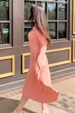 This dress is beautiful and color is true to the photo. It is very lightweight but a double lined material so you don't feel bare. Pockets are deep and helpful. Strapless bra recommended. Great for work or a casual day. I got my usual Medium but I honestly think a Small would have fit as well, so if you want it to be a bit more form fitting around the chest and waist, size down. - Ashley J.