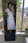 I really like this dress style but the waist kind of falls off me in not a very flattering way... but the dress itself is really nice! Would order again but in a size smaller! - Cassie S.