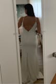 This dress just hangs in all the wrong ways on me :( it would be best for someone thinner and less curvy and that's ok!! The material was just okay. - Felicia B.
