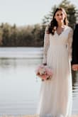 I bought this dress for my wedding in the woods and it was just perfect. It's a little long in length but nothing that can't be fixed. It's an amazing material and I love it. - Lory D.