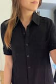 The dress is a perfect fit! I'm usually a size small, but after reading the reviews, I decided to go with XS. I'm glad I did! It feels perfect. I can't wait to wear it out all the time. It has a linen look with a soft cotton feel. I'd recommend this piece as a wardrobe staple. - May L.