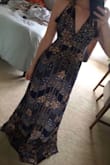 The quality and pattern are exactly as expected, and it's very sexy in a flowy/ breezy way. I highly recommend it for anyone who is interested. That being said, I'm going to need to get this altered at some point before I feel truly confident in it. It's too long for me to walk in without stepping on it or dragging on the floor, which is a no no. I'm going to need it taken in at the waist somehow as well because the elastic doesn't feel tight or supportive enough where I need it to be. I was so close to returning it, but I sent pictures to a few friends who told me to reconsider and pair it with heeled sandals or something. All in all it's a gorgeous dress, but I would be wary if you are short and have a smaller frame. - Erin H.