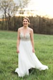My fiancé and I eloped during the corona virus pandemic. This dress made me feel like a real bride. I did have to adjust the straps a bit because the bust sat a little low on my, but overall it was perfect. I've gotten so many compliments on my pictures. Loved this dress!! - Taylor F.