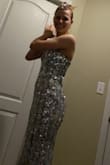 The dress is definitely quality, the sequins don't shake off and the picture is true to size. Unfortunately, if you don't have curves or boobs (itty bitty titty community beware) the dress will look to "heavy." The length was perfect with heels, if I was to rebuy I would but a size smaller as there was a good amount of material in the waist. - Maureen F.