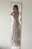 This dress is absolutely stunning and makes me feel like a princess every time I try it on! The fabric is very light and flowy and the floral print with little silver details are gorgeous. However, the top and waist are really big on me so I'll need to get it tailored to fit better and look more flattering. Something the surprised me was that the skirt has a lot of fabric, which is fun for twirling but makes it harder to walk in. It's also a few inches too long for me so, even while wearing 2-inch heels I have to be super careful. The length and super fully and flowy skirt and really pretty but a bit awkward from a functional standpoint. - Shawn K.