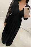 I love this dress, I just wish the sleeves were a little tighter. They look a tiny bit loose but the dress looks beautiful.  Also the length for me is very long so I had to get some taken off the bottom. I definitely recommend. - Paola M.