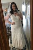 This dress is so stunning. I ended up sewing weights into the liner layer and put a few stitches into it and the outer layer to prevent the liner from riding up, but this dress is SO bridal looking and fits so nicely. It flatters my curves without being TOO sexy, and I think my fiancé will love it! Such a great low budget option that doesn't LOOK low budget! It's a little short on me but that's too be expected since I'm so tall. I just paired with some flat sandals and it will be great! - Alyssa H.