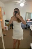 This dress was EXACTLY what I wanted! That being said, I normally would have bought a medium (and a medium still would have fit probably), but I went for a large because I wanted it to be a bit looser for graduation photos. This dress is perfect for curvy girls, as I normally struggle finding a dress that properly fits my waist and hips without being tailored. However, because this is so stretchy it worked perfectly! The material is thick so it will cover any "imperfections", and the dress is super comfy! The material does not feel cheap at all AND as an added bonus the dress was the perfect length, which is another thing I struggle with being relatively tall. I will most definitely be purchasing from here again! (Please ignore the background of my photos as I'm studying for finals and moving lol) - Arielle B.