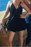 Based on previous reviews saying to order a size up based on length/chest size, I ordered the medium and it fits PERFECTLY! I wore it for the first time for my birthday dinner, and it was sexy but classy at the same time. My boyfriend also made multiple comments about how much he liked it, and he usually doesn't make clothes related comments, haha. I dressed it up with heels for a nice restaurant, but it can also be super casual for daytime. Love that it looks like a dress but has the hidden shorts. Perfect for summer!! - Kait M.