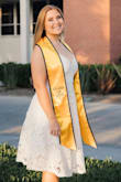 This dress was great for my graduation pictures! It was a little tight wearing a bra, but a little loose without one. It was also very good material, and was heavy to wear, so the straps dug in a little bit. Very flattering and beautiful. - Asia B.