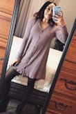 Thick but lightweight material so it has the perfect flow. It is a little short but I am short so it does not bother me much. I wore it with black tights so it didn't seem so short! - Crystal C.