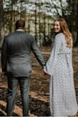 I read other reviews and being so tall went with the XL, which was perfect for length, and not an issue since you are able to tighten up the waist. I wore this dress for a surprise my boyfriend had and he ended up proposing :) - Ivana D.