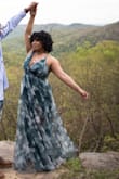 I wore this dress for my engagement photos it fit perfectly, it's super long but that's to be expected since I'm 5'1! I got a lot of compliments on the dress (: - Britnei D.