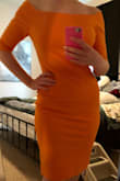Love the fit of the dress. The material is somewhat thick, but stretchy. - Juliana K.