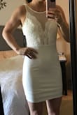This dress is super cute! It is tight and bunches up a little at the bottom, so instead of my shower I think I'll wear it to the bach party! I have a small bust and don't need a bra at all. The dress is comfy and of good quality material! Highly recommend! - Ashlyn L.