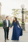 Love this dress! Wore this for our engagement photos and loved the fit of the dress. Just a warning- you will have to get this altered if you are not super tall. I am 5'5 and had to get a significant amount of fabric removed from the bottom, as well as a lot of extra fabric on the sleeves. I sized up for more room in the chest, but overall it fits pretty true to size since it's a true wrap and the waist is adjustable. Would definitely order again! - Chelsea S.