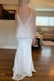 I wanted to love the dress because I love the back. The lace and low cut back are beautiful but the front straps and Lace look cheap. I returned it for another dress. - Julie B.