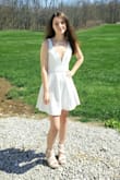 I absolutely love this dress! It fits great and it's made out of a nice material. I cant wait to wear this for my bridal shower! - Sydney A.