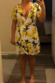 This dress is beautiful, but if you are one the shorter side, with a short torso, this will be very low cut on you. - Erin W.