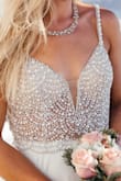 This dress looks SO lux! No one would ever believe the price (so keep me guessing ladies!) but this is a win win win! Price, quality, sexy, sweet, romantic and fits perfectly! I know it says 34B (but if we're being honest after having kids they drained more than just my energy!) so B when the bra is padded let's say! Anyways, this has padding enough to conceal and give figure. The beading is heavy but not too heavy and simply, gorgeous! The rest is lightweight and floats in the breeze. Hugs the bum! And sheer but layered to keep it classy. Not see through. This was THE dress and everything I never could have dreamed of. I had it altered and hemmed after the wedding to now wear as a mini cocktail! And it's cuter than ever! So I hit the dress of my dreams for $100 for the wedding, spent $70 to alter it and now I have a cutesy cocktail I can wear and reminisce with flaunting my best feeling my best! Don't hesitate, just do it! You WONT regret it at all... xo Christina
-BOSTON - Christina B.