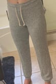 These are made for very tall women. They are high wasted and even when I had them pulled all the way up to my belly button they bunched around my ankles. Way too long! On the model they are shown an inch or two above the ankle (I think that's how joggers are meant to be worn). I'm 5'6" and a half so pretty average height. - Jessica M.