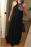 I bought This dress for my maid of honor dress in a summer wedding. It's super light and airy and the slit isn't too high! It fit perfectly everywhere but the length.. I'm short though, so it's about 4 inches I'll need to get hemmed. I'm OK with that though since it fit so well and I love the floral detail of the top! - Victoria G.