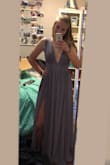 The color and fit of this dress are so flattering! It is tight at the waist which looks incredible! The slit is really pretty and definitely not too showy. The only thing that I was worried about was the straps were a bit too long, so they would probably need to be altered or at least held in place with double side tape to avoid any disasters! - Jennifer M.