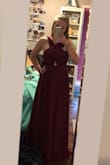 This dress fit really well and was true to size. There is a lot of fabric on top, so just be aware of that. The color was really pretty, but a little more towards burgundy than bright red like the picture shows. Nothing wrong with it, just liked another dress I ordered more! - Jennifer M.