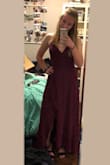 This dress is so beautiful! The color is amazing and the fit is perfect. The straps can be adjusted to fit which is really nice. The ruffle looks great and is just open enough to see a pair of pretty shoes. It was the perfect height for me with a low heel on and just barely hit the ground, but someone shorted would probably need it altered a bit. All of the details on this dress are perfect and I can't wait to wear it! - Jennifer M.