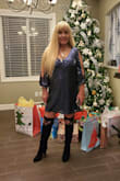 My mom's a sucker for a cold shoulder and got this for her Xmas party and rocked it with thigh high boots 
She got a ton of compliments
High quality material and beautiful look to the blue sequins this dress is a modest show stopper - Jennifer C.