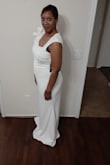 I ordered a size larger anticipating alterations. It fits me perfectly! Very pleased with my purchase! - Jennifer M.