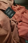 Ordered 2 maxi dresses, different styles. Both in rusty rose. This one is more of a burnt orange color (right picture). Very disappointing. - Lauren S.