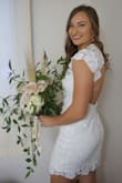 Love this dress! I ordered it last minute for my small wedding during the Covid-19 crisis and it fit perfectly. I normally am a medium in most clothes but the small fit perfectly. I didn't have to wear a bra either. It is a great choice! Ships fast too. - Lexie R.