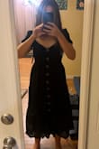 This dress has pockets and It makes my hips look a lot wider than they really are. Also, the bust of this dress is super tight, but everywhere else was loose. If you are a busty gal, there's no way this would fit. - Molli B.