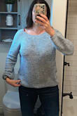Love this sweater. Very comfortable though it runs large. Mine kept falling off the shoulder but it was actually cute that way. If you want a tighter fit, order a size down for sure. - Christal V.