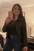 I bought this to wear out for a girls night and paired it with a leather jacket. This definitely fits true to size and I purchased a small and medium. I kept the medium because it wasn't as tight as the small and had a little more coverage in the upper chest area. - Alex R.