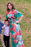 Beautiful dress! I got lots of compliments. The colors are stunning. I'm usually in between a small and a medium. I sized down due to the reviews and I'm glad I did. It fit really well but it was very long. - KARLA T.