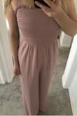 Looks like the photo, the top part is form fitting of course and the legs are very wide and long. The color is light dusty rose. Very comfortable - Nevena G.