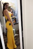 If it was socially acceptable to get married in a yellow dress, I would. I've been in love with this dress for the past year and finally had the occasion to wear it! I ordered it months in advance and WOW it's beautiful! It's definitely on the longer side but I'm pretty short so that was to be expected. Unfortunately I didn't end up going to the event because of coronavirus but I can assure you this dress will earn its showstopping night because it is GORGEOUS. It's tight but very flattering. - Kayla L.