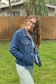 Don't size down! I know a lot of the other reviewers are recommending to size down, but honestly, this jacket is PERFECT as-is. I'm normally a Medium in almost everything, so I stuck with a Medium here and it was great. It's meant to be a bit oversized, but it doesn't look bad, it just looks cute and comfy. You could also take advantage and layer with a long-sleeved thermal or a hoodie in the fall and winter months.
I'm in love! - Lara C.