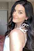 I got this top in white, the material is a little sheer, but doesn't require a bra so no issue! Straps are adjustable and stretchy so no digging into your skin - the top is not stretchy though and there is no zipper so I would consider sizing up! Overall sooo cute, wearing with oversized jeans, heels, hoops, and shoulder bag to go out with my girlfriends or with joggers and sneakers to run errands or go to the park! :) - Jenna P.