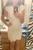 This is such a stunning dress. The fit flatters and accentuates curves, but doesn't feel too tight. However, I do think I will have to take it to the tailor to get it brought in ever so slightly in the back, just to make it all come together. Other than that, though, it really is the dream bridal shower or graduation dress!!! It is absolutely beautiful material. - Gabriella Z.