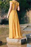 Beautiful flowy dress perfect for senior pictures and perfect yellow color! - Madison S.