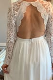 I got this dress for a courthouse wedding because my original wedding day was canceled due to Covid 19. Courthouses were also closed, so my fiancé and I still dressed up and shared our rings. I will wear this dress in October for rehearsal dinner. Super comfortable, very well made, lace was so soft and comfy. Length is long-which nice you may need that tailored if not wearing heels etc. - Breanne B.