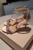 The shoes are better than expected. The beautiful. The satin is perfect! And the jewels look amazing. - Amelia G.