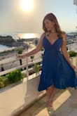 I wore this dress to a wedding last summer and I loved it! I got so many compliments too. I had to use some fashion tape to help the dress stay put because it has a bit of a deep V, but it worked pretty well. - Anne F.